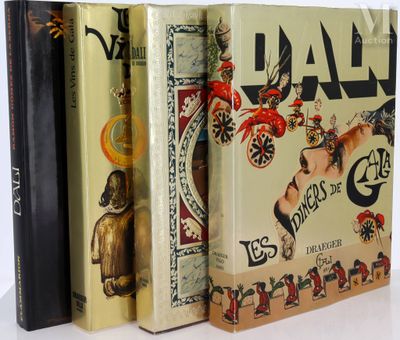 three books are stacked on top of each other on a white surface