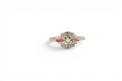 a diamond and ruby cluster ring