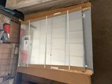 a lot of boxes and a window in a room