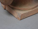 a close up of a statue of a man with a hat on