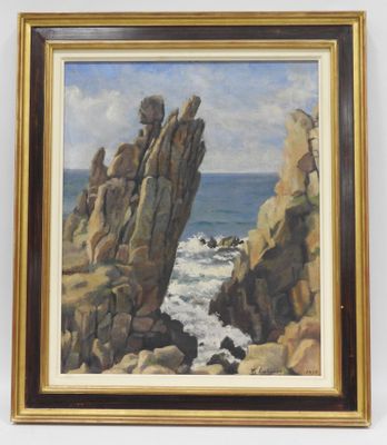 peinture à l'huile encadrée représentant une côte rocheuse avec une mouette au premier plan