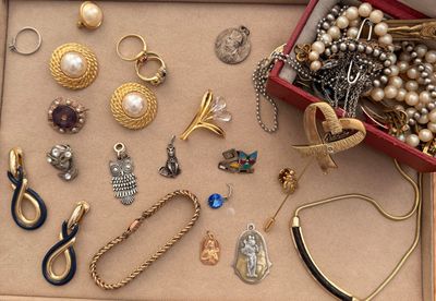 a box of jewelry that is sitting on a table