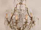 an image of a chandelier with several lights hanging from it