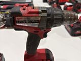 a close up of a bunch of power tools on a table