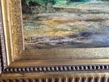 a picture of a picture of a painting in a gold frame