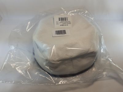 a white cake in a plastic bag on a table