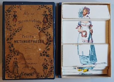 une boîte sur laquelle figure l'image d'une femme en robe