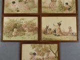 four framed pictures of children playing in a field with a dog