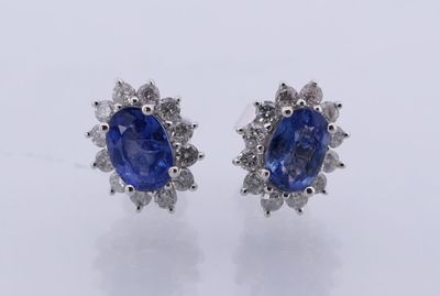 Très jolie paire de boutons d'oreilles en or blanc 750°/.(18…