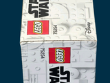 a box of lego star wars items on a blue background