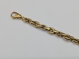 a gold chain bracelet with a clasp on a white background