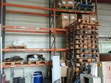 a room with a lot of boxes and a machine in it