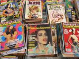 a lot of magazines that are on the table
