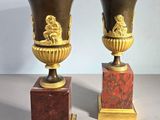 pair of antique bronze vases with red and gold marble bases