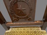 a chair that has a star on the back of it