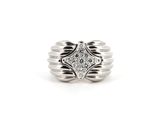 a close up of a diamond ring on a white background