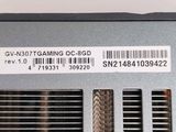 the back side of a computer with a barcode on it