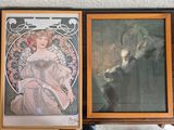 two framed pictures of a woman and a cat