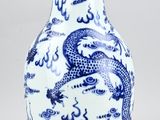 blue and white porcelain vase with dragon design
