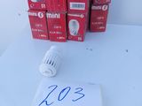 a lot of red boxes and a white light bulb on a table
