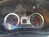 a close up of a car dashboard with gauges and numbers