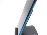 a cell phone that is sitting on top of a stand