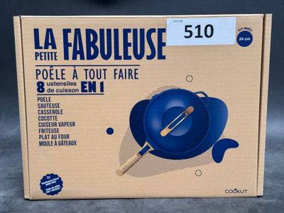 packaging of a blue frying pan with a wooden spatula in it