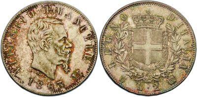 a silver coin with a crown on the front and a crown on the back