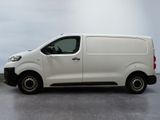 a white van that is parked in a parking lot