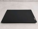 a laptop that is sitting on a white surface
