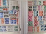 many different stamps on the wall in this room