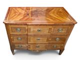 an image of a wooden chest of drawers with drawers on each side