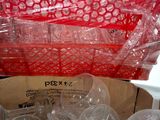 a box full of empty plastic cups and cups in it