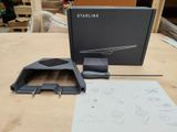 the box is open on the table with the contents of the device