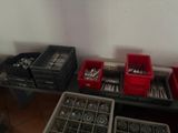 a table with many different types of silverware on it