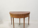 an image of a small table in the corner of a room