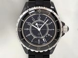 the watch is black and has a black dial