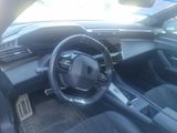 the interior of a car with a steering wheel and dashboard