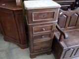 several pieces of furniture are stacked on top of each other in a room