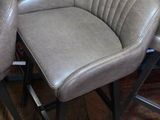 two chairs that are sitting next to each other on the floor