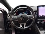 the interior of a car with a steering wheel and dashboard controls