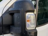 an image of a side view mirror of a truck
