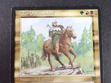 a picture of a card with a picture of a man riding a horse