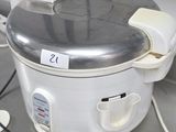 a crock pot sitting on a counter in a kitchen