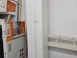 a lot of shelves in a room with a lot of items