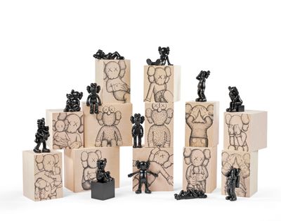 a lot of wooden blocks that have black and white drawings on them