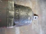 a close up view of a drill head on a table
