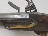 a close up of a gun that is on display