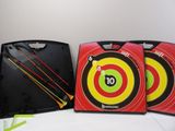 three arrows are in the middle of a red target with a yellow arrow