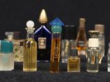 a lot of bottles that are lined up on a table